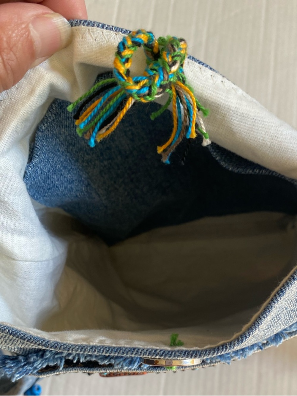Upcycled Boho Denim Tassel Crossbody Bag with Beads and Embroidery - Picture 8 of 13